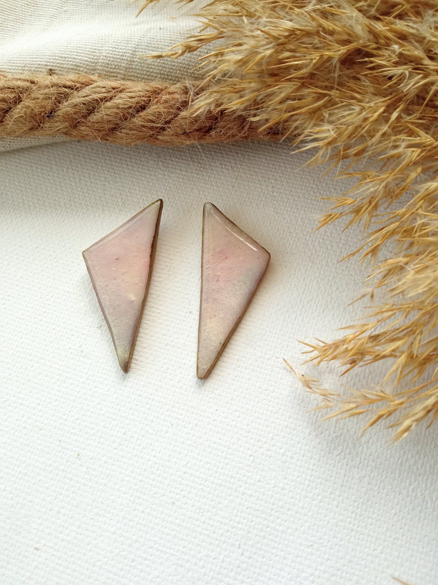 Translucent metallic triangular studs